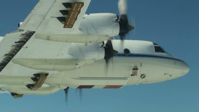 Close up on NASA P-3 flying.